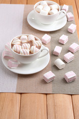 Cups of hot chocolate with marshmallows