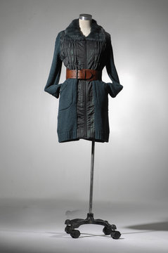 Full length female coat clothing on mannequin
