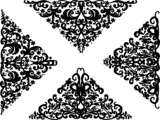 four black triangular ornaments isolated on white