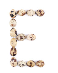 quail eggs in the form of letter E. © indigolotos