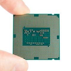 Computer's processor in hand on a white - 1 to 1 ratio
