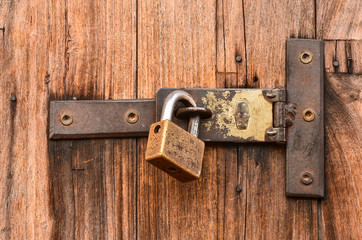 Old wooden door with key lock