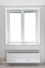 White plastic double door window with radiator under it.