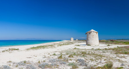 Fototapeta na wymiar Windmill at Gyra beach, Lefkada