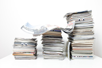 Stacks of Magazines with Googly Eyes