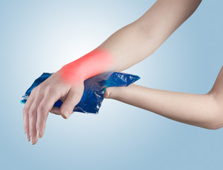 Cool gel pack on a swollen hurting wrist.