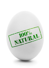 White egg with grunge label 100% Natural isolated