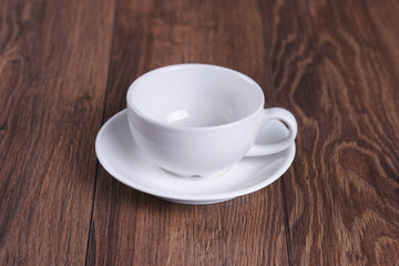 White mug on a wooden table