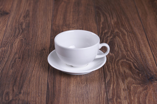 White mug on a wooden table