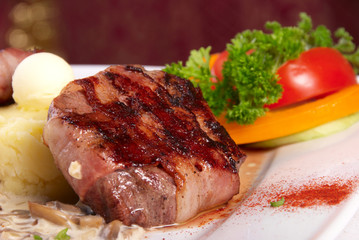 grilled meat with bacon