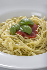 spaghetti on white plate