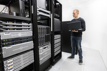 It technician monitors data center
