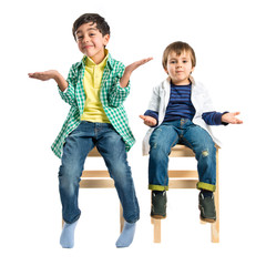 Kids with doubts over white background