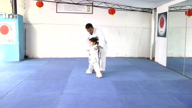 Caucasian girl at karate practice