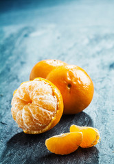 Fresh peeled clementine with segments
