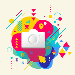 Photo camera on abstract colorful spotted background with differ