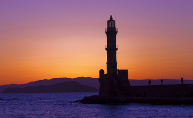 Hania harbor with lighthouse at sunset, Crete, Greece