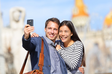 Lovers - young couple happy taking selfie photo