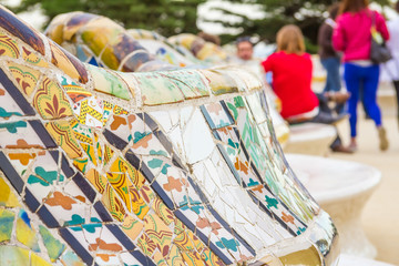 Colorful mosaic bench of park Guell in Barcelona
