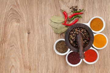 Mortar and pestle with pepper and spices