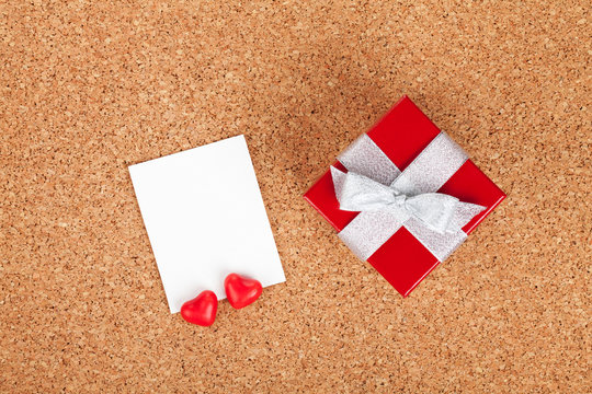 Blank valentines photo frame and small red gift box