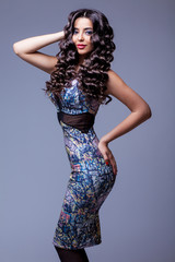 Fototapeta premium Beautiful Brunette Girl with Healthy Long Hair