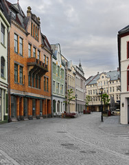 view on streets and houses at city of Alesund , Norway