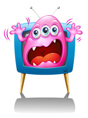 A TV with a pink monster screaming