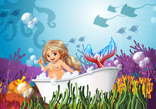 A bathtub under the sea with a mermaid