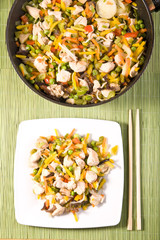 chinese food chicken with vegetables in tomato sauce