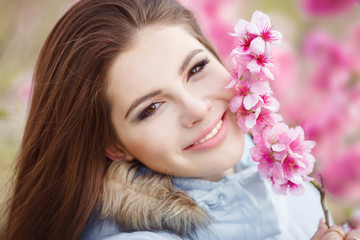 Happy teenager girl at green spring nature