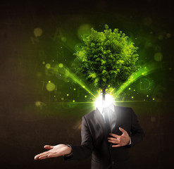 Man with green tree head concept