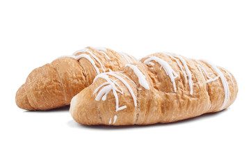 Fresh and tasty croissant over white background