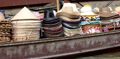 Hats for sale at Damnoen Saduak Floating Market - Thailand.
