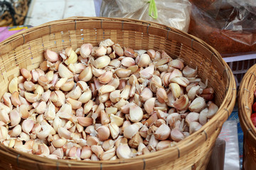 A lot of garlic in a basket