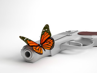 Fototapeta na wymiar Closeup of butterfly on handgun | Concept war and peace