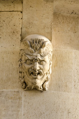 Gargoyle head on the pont neuf