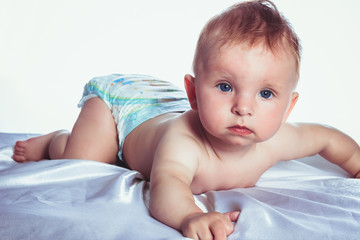 beautiful baby in diapers