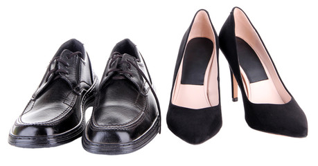 Beautiful black female and male shoes, isolated on white