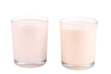 Delicious yogurt in glasses isolated on white