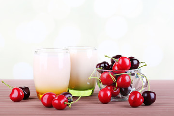 Delicious yogurt with fruits tastes in glasses and fresh fruits