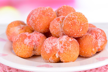 Delicious cookies peaches on table on light background