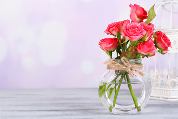 Beautiful small pink roses, on light background