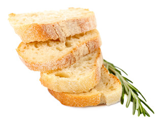 Fresh bread and rosemary isolated on white