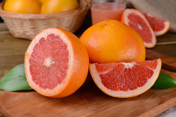 Ripe grapefruit on table close-up