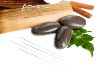 Composition with needles for acupuncture, isolated on white