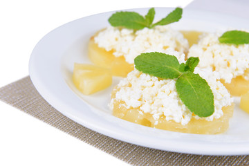 Tasty pineapple with cottage cheese, isolated on white