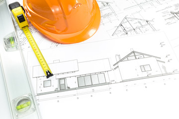 Orange helmet and project drawings