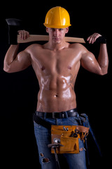 young muscular worker holding hatchet