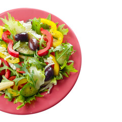 Healthy vegetable fresh organic salad over white